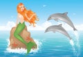 Mermaid and two dolphins. Royalty Free Stock Photo