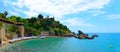 Mermerli Plaji or Mermerli beach with clear azure water in old town Kaleici district city Antalya