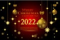 Christmas and New Year 2022 background. Glass Balls hanging on ribbon. Bright Winter holiday composition. Royalty Free Stock Photo