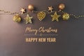 Merry Chrismas and Happy New Year, gold chrismas ball hanging on the background Royalty Free Stock Photo