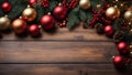 Merry Christmas background. New Year\'s decorations on wooden table - colorful balls and gifts. Top view with copy space