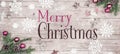 Merry Christmas background - Pink Christmas ornament corner border banner, with christmas balls, fir branches and pine cone and