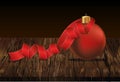 Merry Christmas ball with red ribbon. Banner with copy space. Vector on wooden background. Greeting card For a holiday or a party Royalty Free Stock Photo