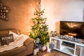 Merry Christmas beautiful living room tree setup aith gifts decorated for Happy Holidays at home