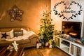 Merry Christmas beautiful living room tree setup aith gifts decorated at home textspace saying merry christmas in German