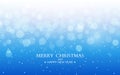 Merry Christmas blue background. Happy New Year winter design. Xmas text with snow flakes and defocused elements. Frost Royalty Free Stock Photo