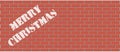 Merry Christmas - brick wall background Royalty Free Stock Photo