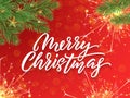 Merry Christmas calligraphy lettering and Xmas gold stars decoration background. Vector Christmas tree ornaments and glittery fire Royalty Free Stock Photo