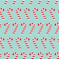 Merry Christmas Candy Cane. Seamless Pattern. Flat design. Blue background. Royalty Free Stock Photo