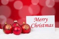 Merry Christmas card with balls for wishes Royalty Free Stock Photo