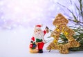 Merry christmas card with Santa Claus figurine. Lights background with space for text. Winter holidays. Xmas Royalty Free Stock Photo