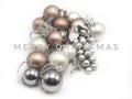 Merry Christmas card with silvered and golden balls in white background