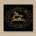 Merry Christmas card on wooden background
