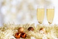 Merry Christmas. Champagne two glasses celebrating and party Christmas at home. Royalty Free Stock Photo