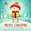 Merry Christmas! Cheerful snowman with gift present in Christmas snow scene winter landscape