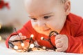 Merry christmas christmas and happy new year, infants, childhood, holidays concept - close-up 6 month old newborn Royalty Free Stock Photo