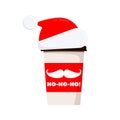 Merry Christmas coffee or tea cup decorated santa claus mustache, ho-ho-ho text isolated on white background. Royalty Free Stock Photo