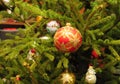 Merry Christmas Colorful Balls on the evergreen tree as a Holidays Background. Vintage Christmas Decoration - Christmas Balls Royalty Free Stock Photo