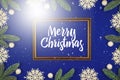 Merry christmas composition on blue background, wooden frame and decorations, snow, postcard, card Royalty Free Stock Photo