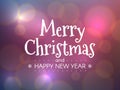 Merry Christmas concept. Happy New Year inscription with color bokeh background. Bright Xmas title with defocused