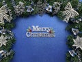 Merry christmas on blue and silver theme background