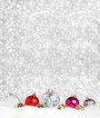 Merry Christmas decoration ball on white fur at silver bokeh light background,Banner vertical Holiday greeting card Royalty Free Stock Photo