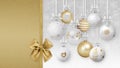 Merry Christmas decorative golden and white balls with shiny ribbons bows and glitter patterns, hanging on blurred lights snow Royalty Free Stock Photo