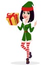 Merry Christmas. Elf woman holding yellow gift box. Royalty Free Stock Photo