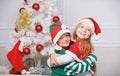 Merry christmas. Family holiday tradition. Children cheerful celebrate christmas. Kids christmas costumes santa and elf Royalty Free Stock Photo