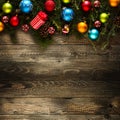 Merry Christmas Frame with real wood green pine and colorful baubles, Royalty Free Stock Photo