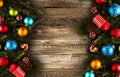 Merry Christmas Frame with real wood green pine and colorful baubles, Royalty Free Stock Photo