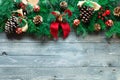 Merry Christmas Frame with real wood green pine, colorful baubles Royalty Free Stock Photo