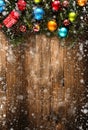 Merry Christmas Frame with Snow and real wood green pine and baubles Royalty Free Stock Photo