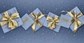 Merry christmas, gift box with golden ribbon bow isolated on blue sparkle background with stars, gift greeting card ticket top Royalty Free Stock Photo