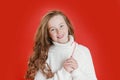 Merry Christmas girl in white sweater on bright red vivid color background Royalty Free Stock Photo