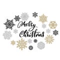 Merry Christmas on gold and silver snowflakes background. Holiday modern dry brush ink lettering for greeting card Royalty Free Stock Photo