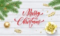 Merry Christmas golden decoration and calligraphy font on white wooden background for greeting card. Vector Christmas or New Year Royalty Free Stock Photo