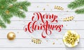 Merry Christmas golden decoration, greeting card calligraphy font on white wooden background. Vector Christmas tree and New Year g Royalty Free Stock Photo