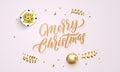 Merry Christmas greeting card background design template of golden glittering hand drawn calligraphy text confetti decoration Royalty Free Stock Photo