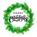 Merry Christmas greeting card design with calligraphy lettering on holly wreath background. Vector Xmas tree lights decoration and Royalty Free Stock Photo