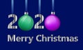 Merry Christmas greeting card design. Number 2020 with zero made from Christmas ball, realistic green and pink glass Royalty Free Stock Photo