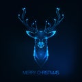 Merry Christmas greeting card with futuristic glowing low poly deer head on dark blue background Royalty Free Stock Photo