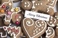 Merry Christmas Greeting Card with Gingerbread Cookies Royalty Free Stock Photo