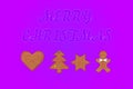 Merry Christmas greeting card with gingerbread cookies Royalty Free Stock Photo