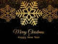 Merry Christmas greeting card. Gold snowflakes and glitter on Dark background. Merry Christmas and Happy New Year text. Royalty Free Stock Photo