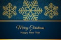 Merry Christmas greeting card. Gold snowflakes and glitter on Dark blue background. Merry Christmas and Happy New Year Royalty Free Stock Photo