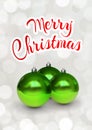 Merry Christmas greeting card with green christmas balls Royalty Free Stock Photo
