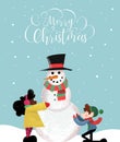 Christmas card of happy children making snowman Royalty Free Stock Photo