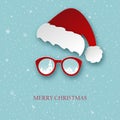 Merry Christmas greeting card with paper Santa Claus hat and sunglasses Royalty Free Stock Photo