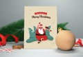 Merry Christmas Greeting Card With Rock Santa Claus, Xmas Trees, 3D Bauble, Stars, Candy Cane And Fir Leaves Against